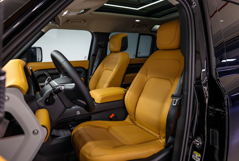 Land Rover Defender 110-X 2024 front seats side view