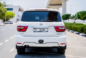 Rear view of White Nissan Patrol LE Platinum