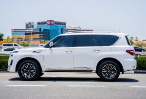 Side view of white Nissan Patrol LE Platinum