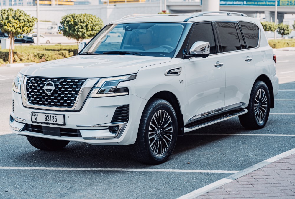 Nissan Patrol LE Platinum (white) on road