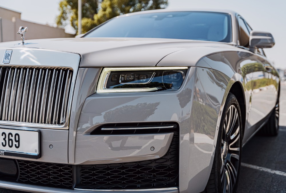 Grey Rolls-Royce Ghost headlights up close