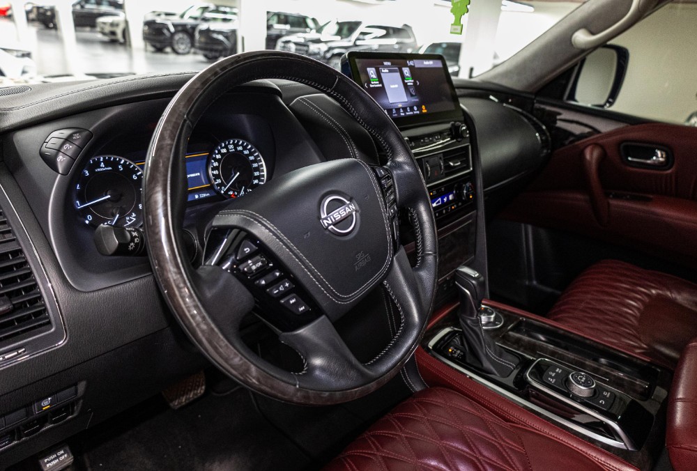Dashboard view of Black Nissan Patrol LE Platinum