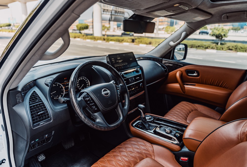Seat view of white Nissan Patrol LE Platinum