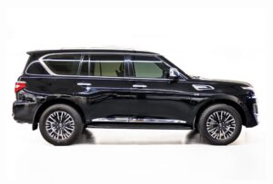 Side view of Black Nissan Patrol LE Platinum