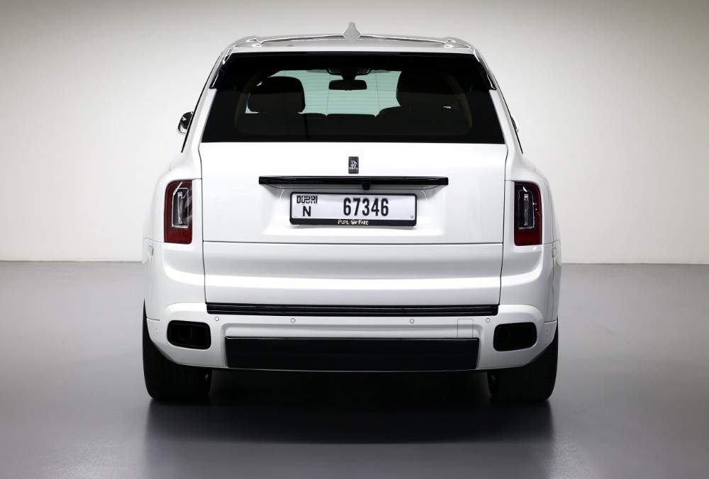 Rear view of white Rolls-Royce Cullinan Black Badge