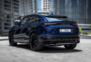 Blue Lamborghini Urus rear angle view