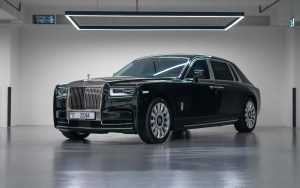 Side view of a Rolls-Royce Phantom, luxury sedan with iconic design features.