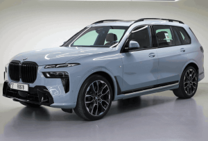BMW X7 40i luxury SUV parked in Dubai skyline view