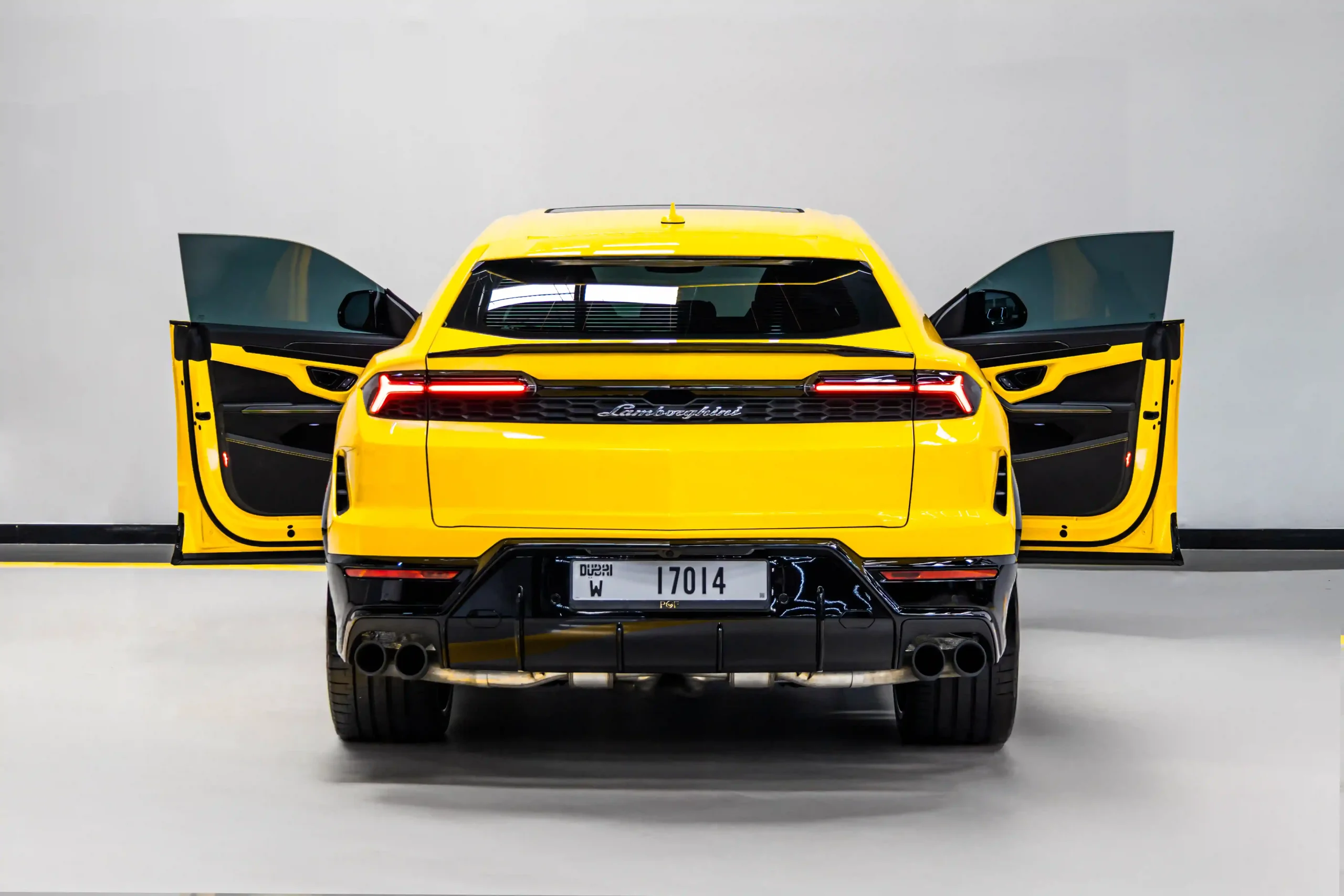 yellow-lamborghini-urus-2025-rear-angle-view-door-open