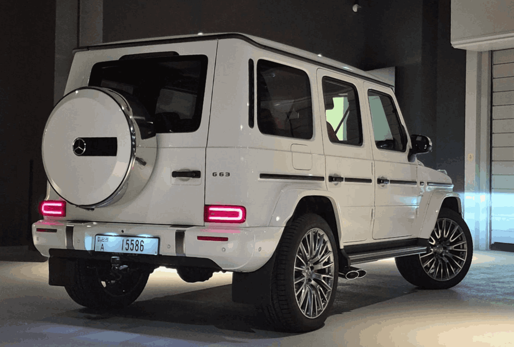 White Mercedes G63 AMG rear side view