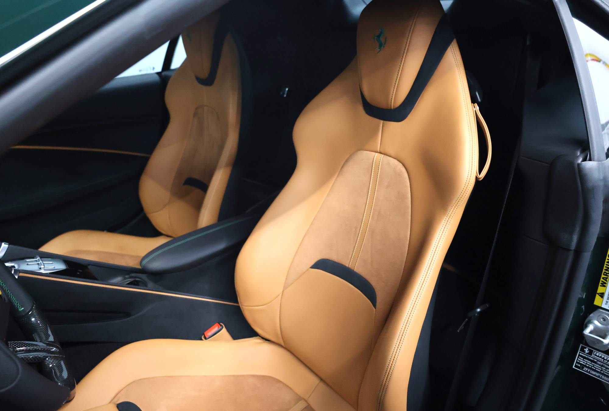 Green Ferrari Roma Spider front seat view
