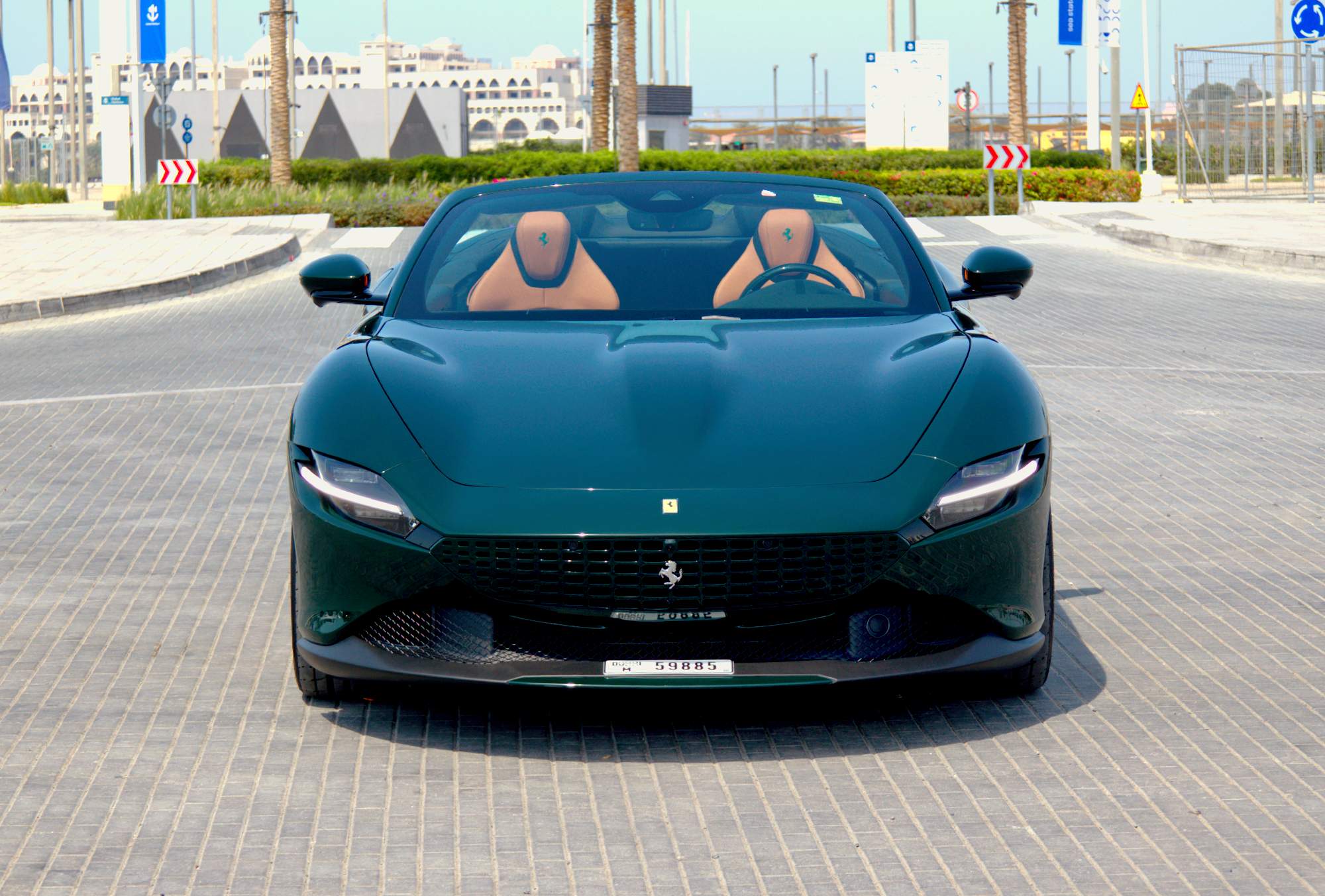 Rent Green Ferrari Roma Spider in Dubai
