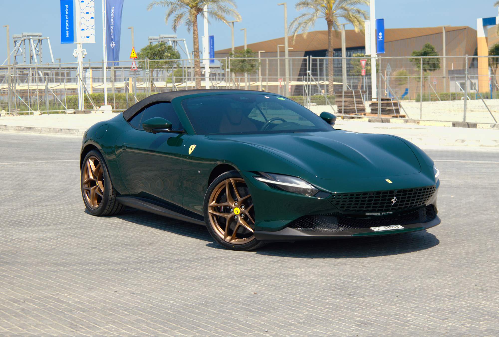 Green Ferrari Roma Spider side view