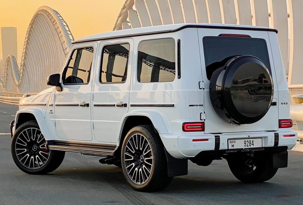 White 2025 Mercedes G63 AMG rear angle view
