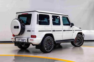 White 2025 4.0L V8 Mercedes G63 AMG rear angle view