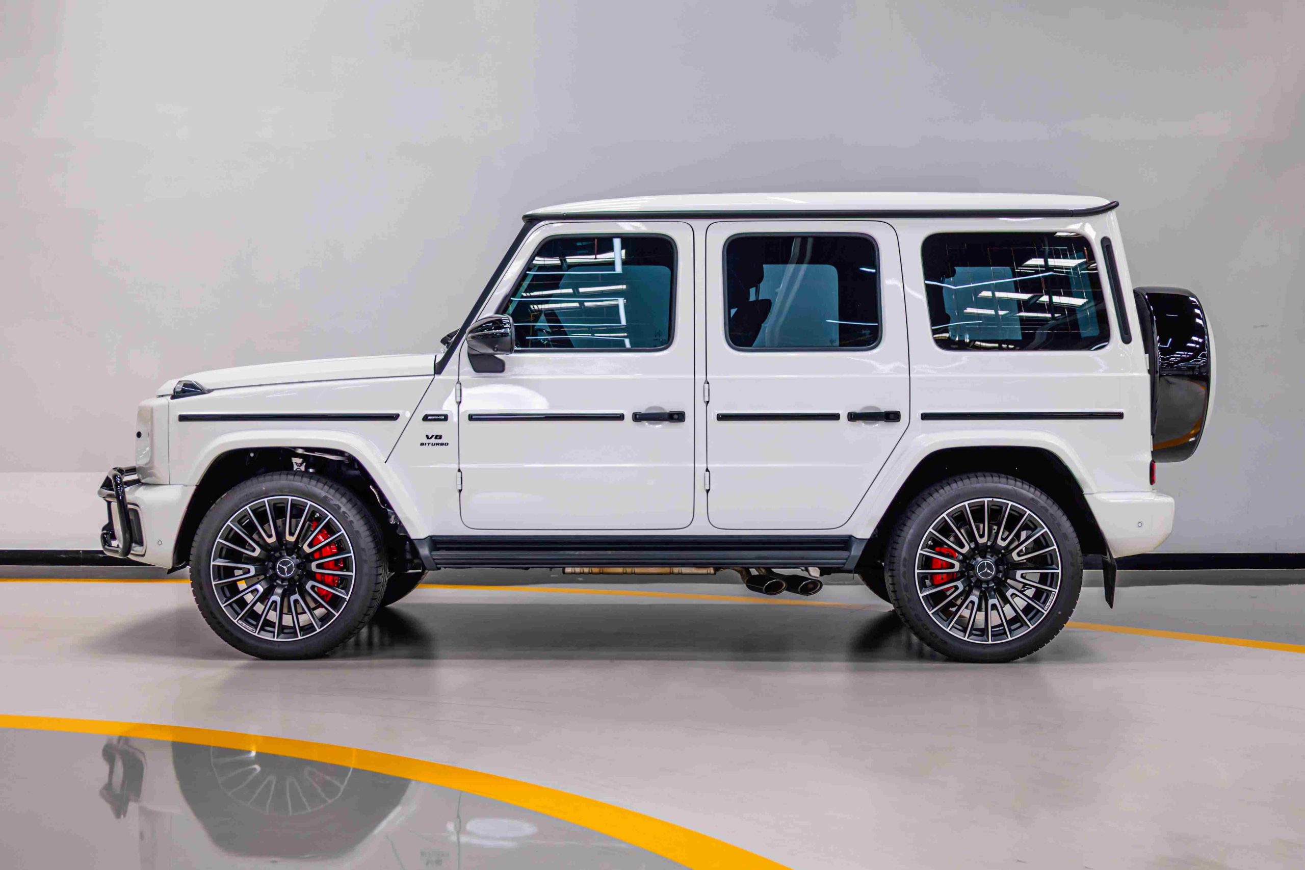 White 2025 4.0L V8 Mercedes G63 AMG side profile