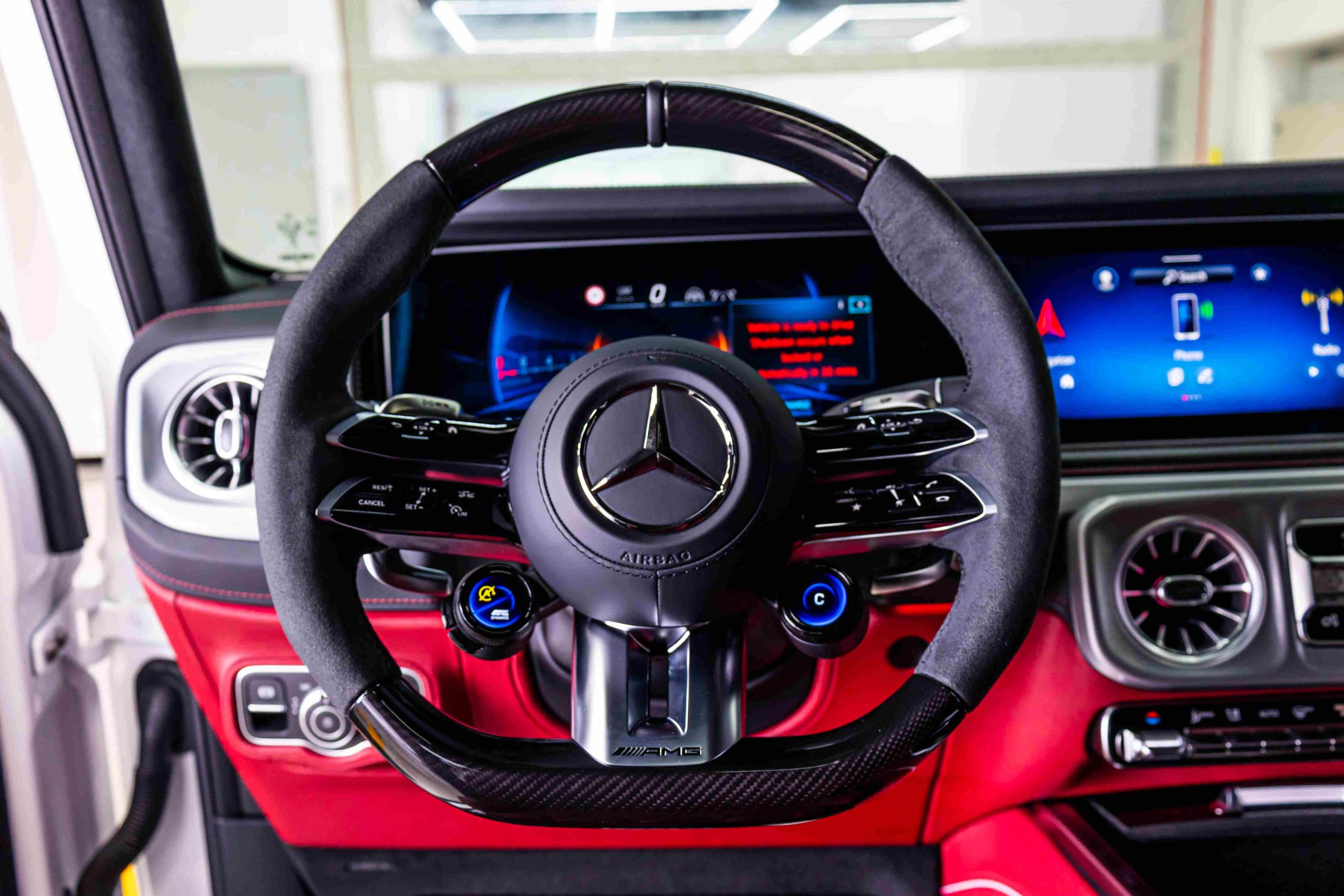 White 2025 4.0L V8 Mercedes G63 AMG steering wheel