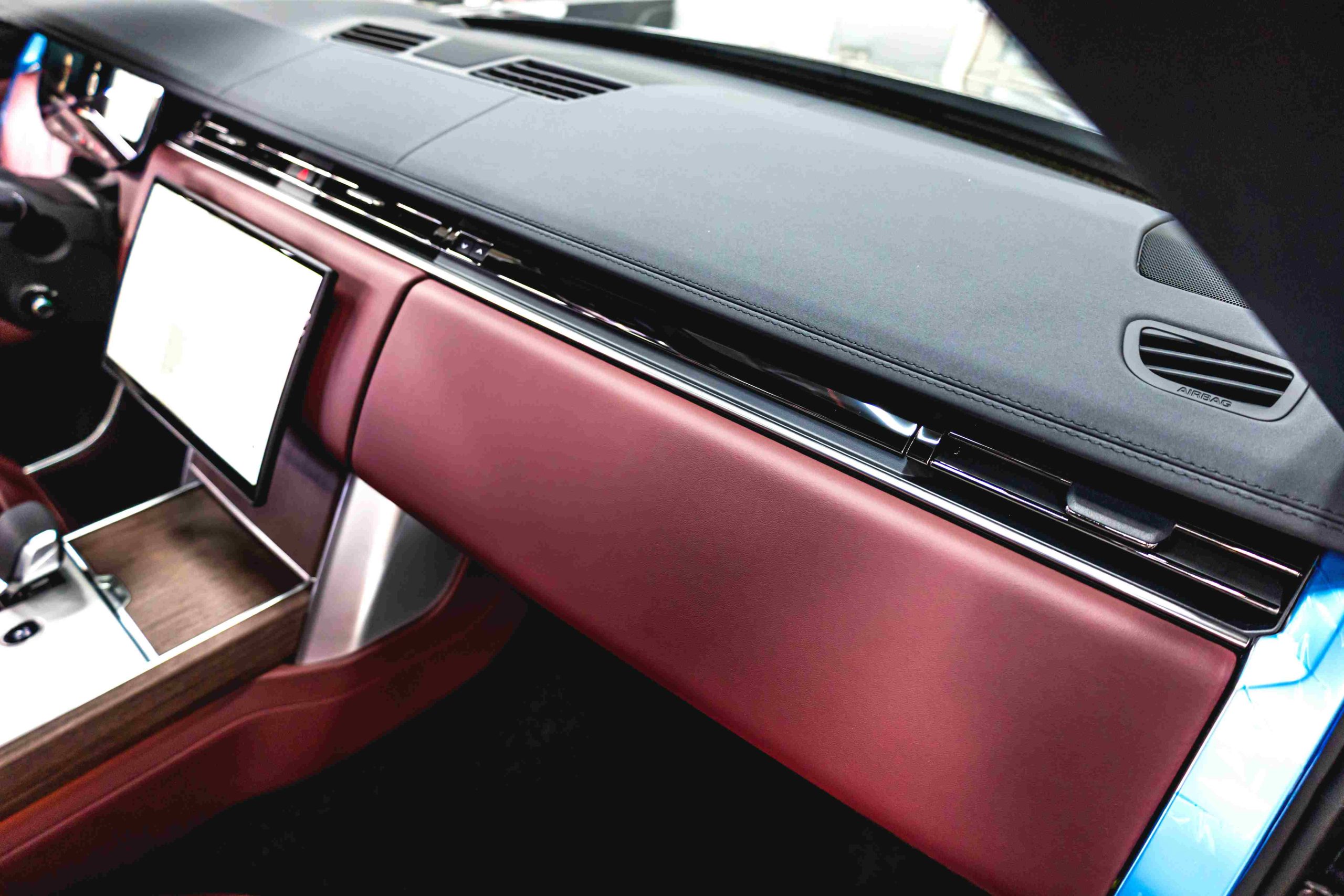 Grey Land Rover Range Rover HSE interior side view