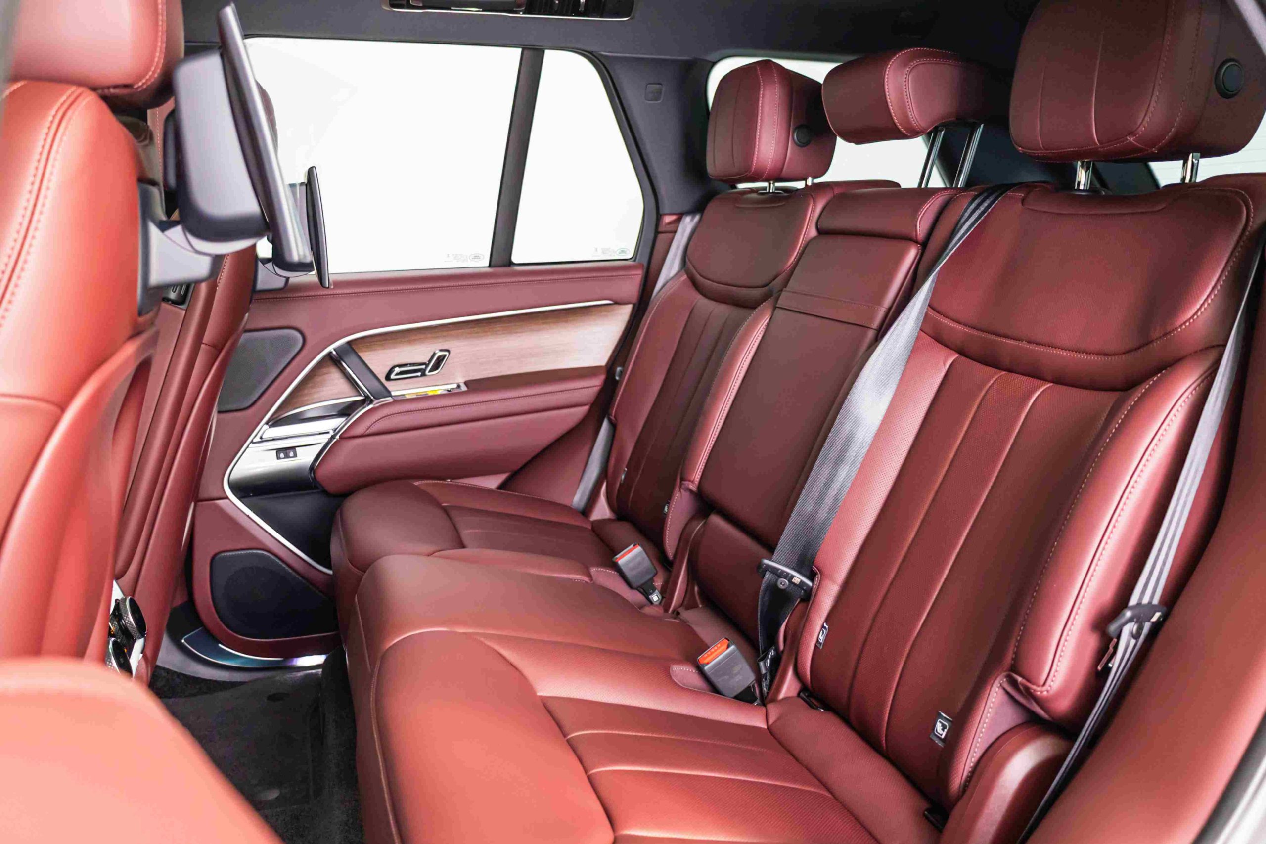 Grey Land Rover Range Rover HSE rear seat view