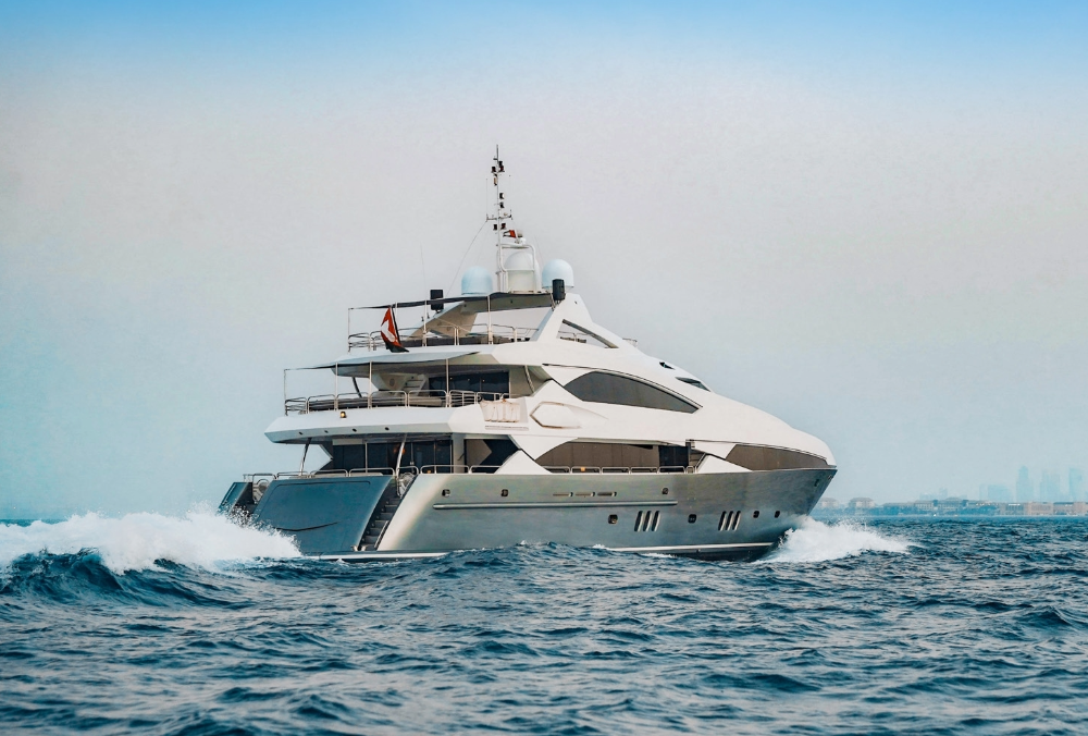 Encore-131ft -Sunseeker-luxury yacht-cruising-in-Dubai-with-guests-enjoying-a-luxury-yacht-charter