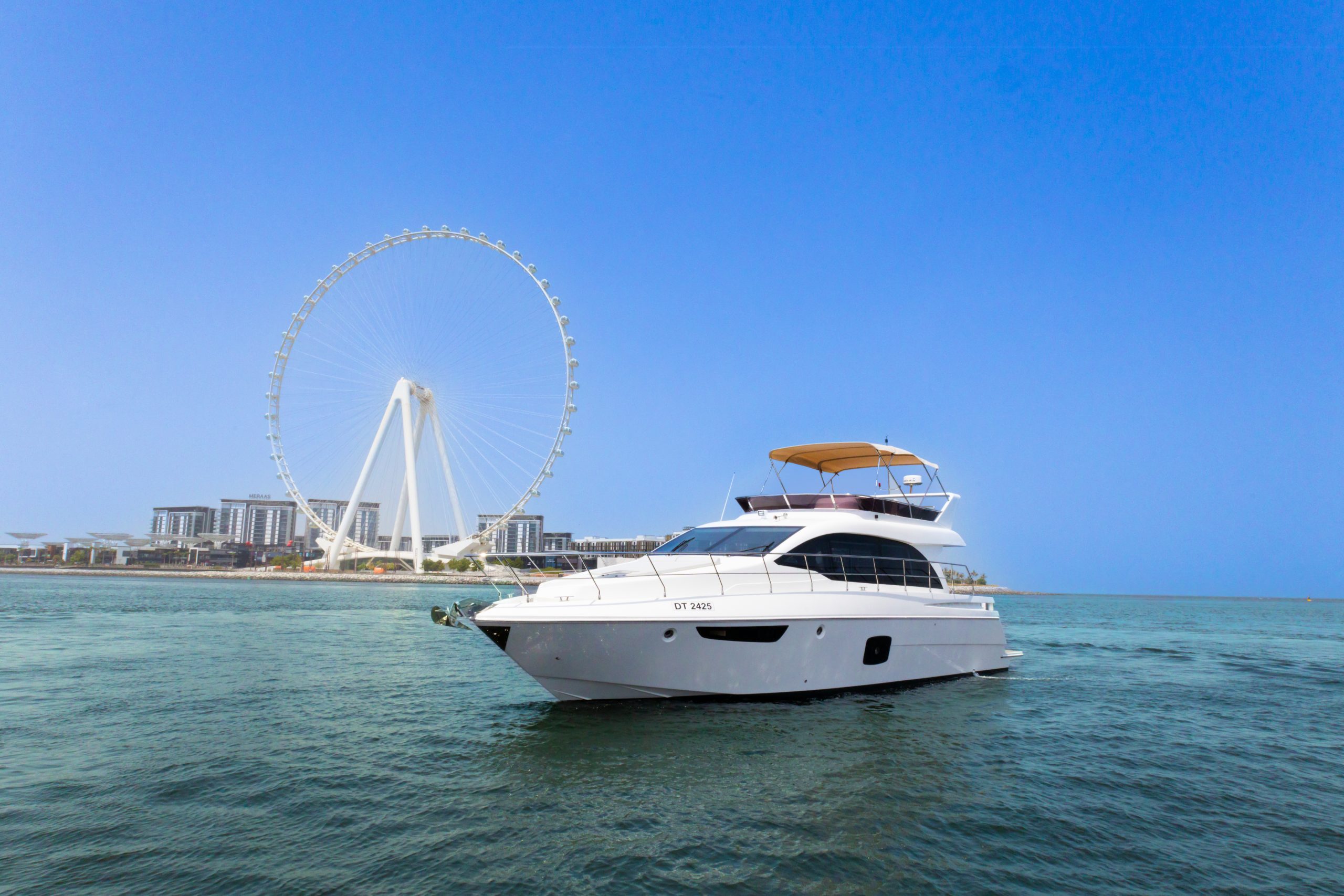 ACE C-52 luxury yacht rental in Dubai featuring two private cabins, spacious sun deck, and capacity for 17 guests—ideal for private charters and events.